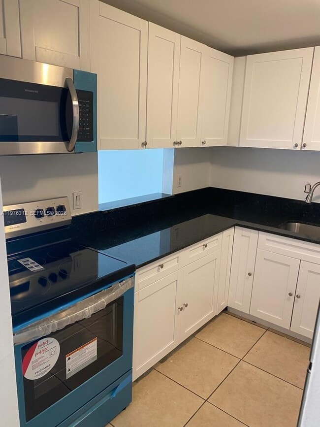 Building Photo - 5122 NW 79th Ave Unit 303