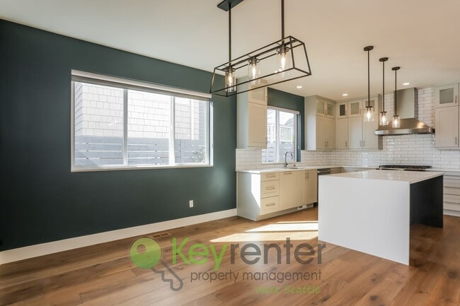 Photo - Spacious Living with Balconies, Deck, and Private Yard