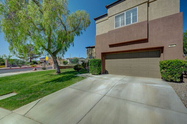 Photo - Situated on a beautifully landscaped oversized corner lot within the gated community of Desert Bl...