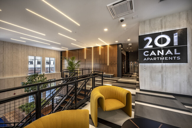 Lobby At Main Entrance With Backlit 201 Canal Apartments Sign - 201 Canal Apartments