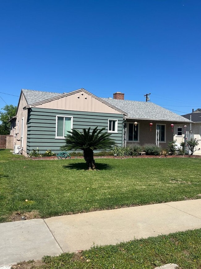 Photo - Home with a Cabin Style Family room and backyard Oasis