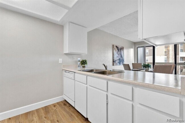 Photo - 4896 S Dudley St Unit 6-8