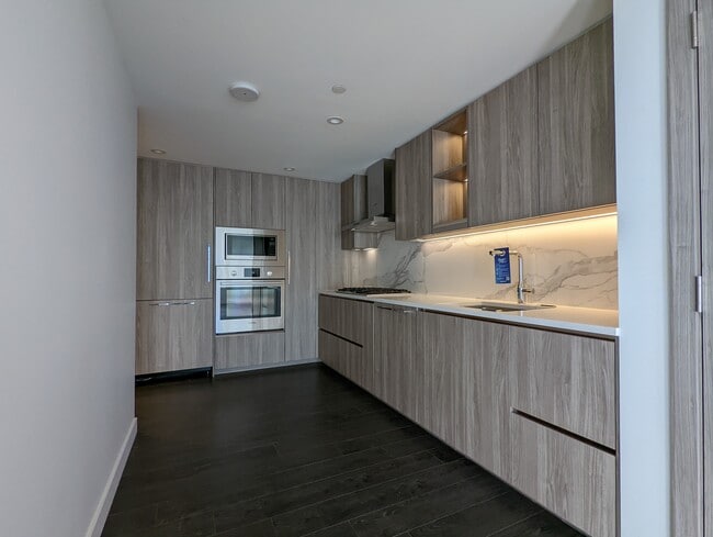 Photo - 1010-9887 Whalley Boulevard Unit 1010