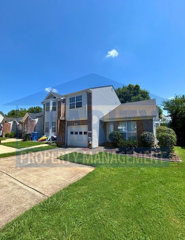 Building Photo - 3-bedroom condo w/ attached garage!