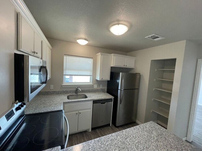 Photo - Close to school/ Granite countertop