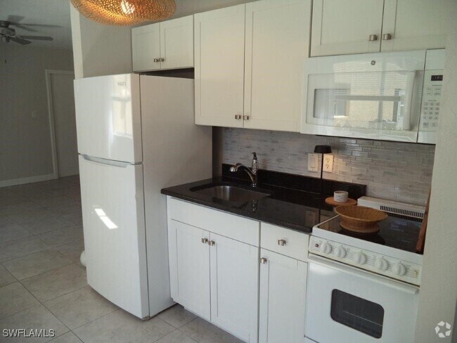 Building Photo - 8093 Country Rd Unit 102 Rental
