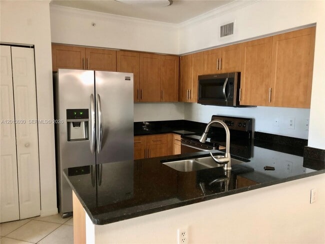 Building Photo - 6559 Emerald Dunes Dr Unit 304