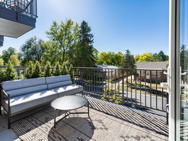A private balcony at Modera University Park, offering treetop views and a quiet retreat just moments from the charm of University Park.