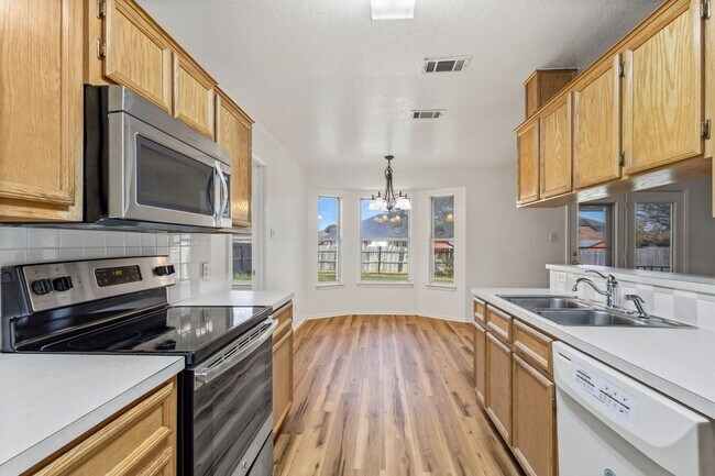 Photo - Move-In Ready 4/2 with No Carpet, Washer & Dryer Included – Prime Killeen Location Near Fort Hood!