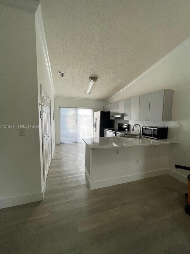 Photo - 3375 W 76th St Unit 211