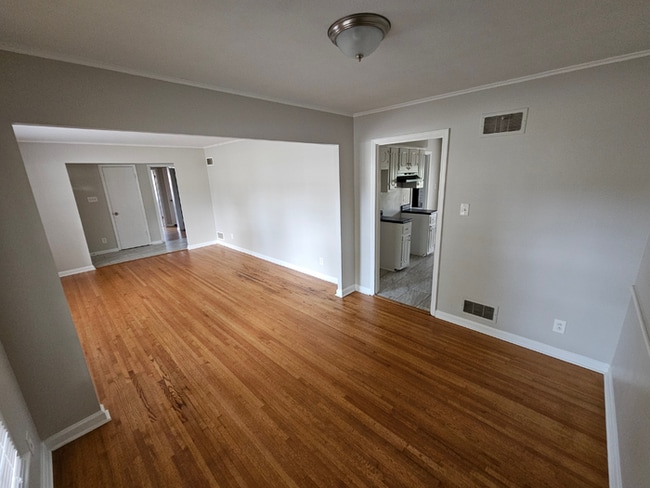Photo - Massive 4BR/3BA Memphis Rental | Brick Fireplace & Built-Ins | Fenced Yard!