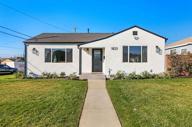 Front of the house. Corner unit home with beautiful space.