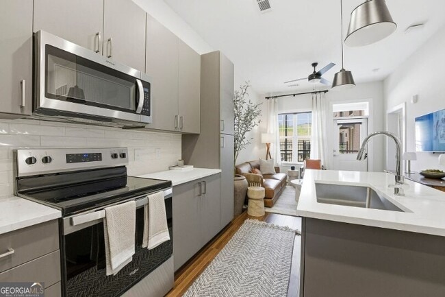 Building Photo - 1400 Lake Hearn Dr NE Unit 2116