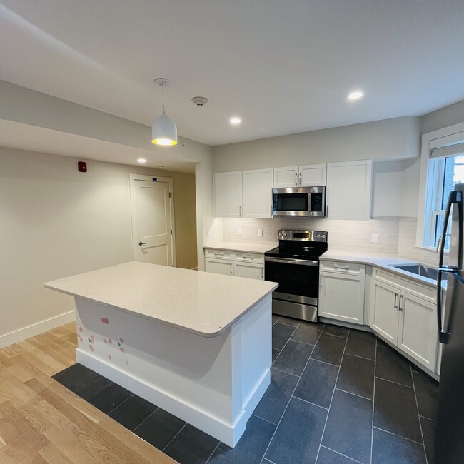 Building Photo - 58 JFK St Unit 4 Rental