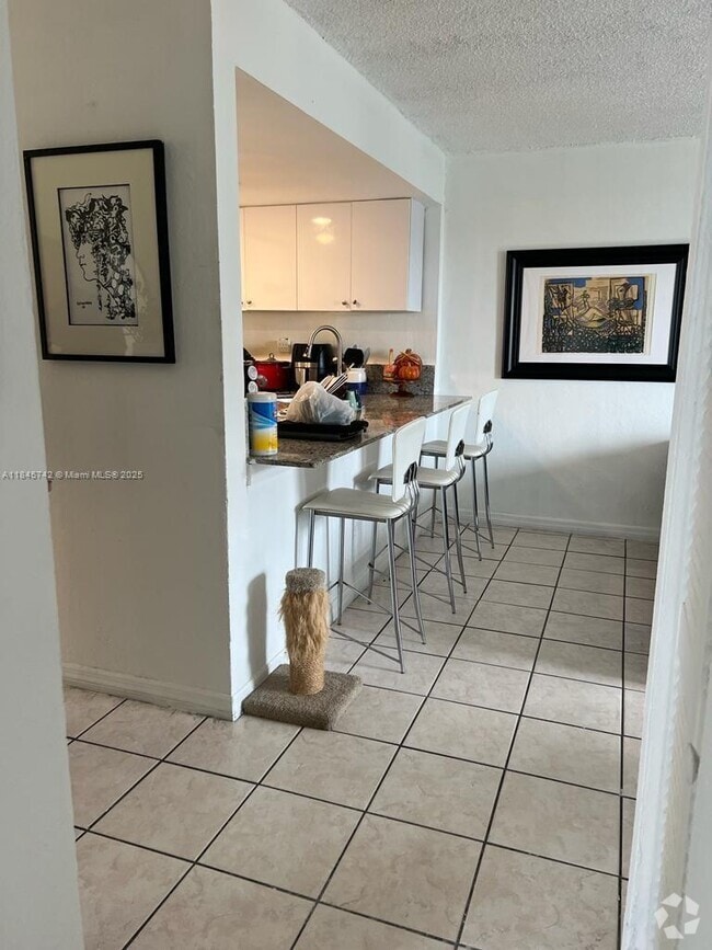 Building Photo - 4550 NW 9th St Unit 320E Rental