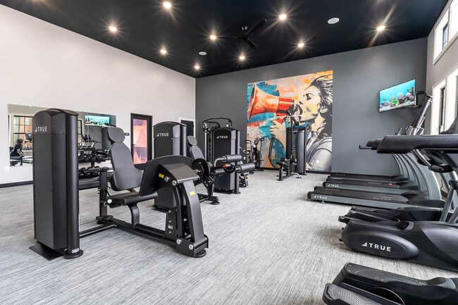 Experience the ultimate workout in this fully-equipped, stylish fitness center.