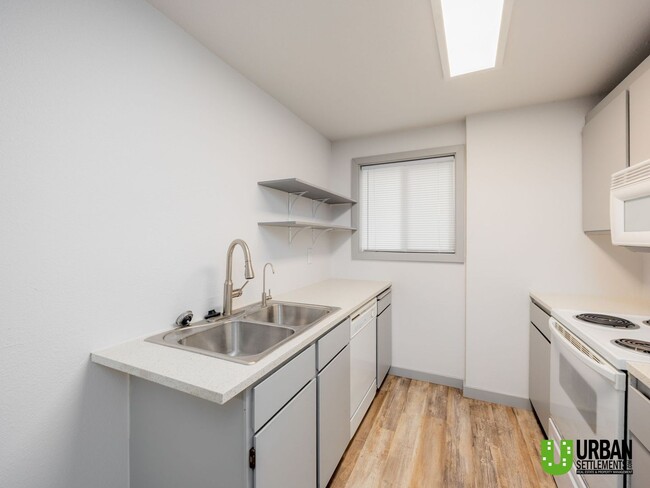 Photo - Charming 2-Bedroom Downstairs Condo with Community Pool