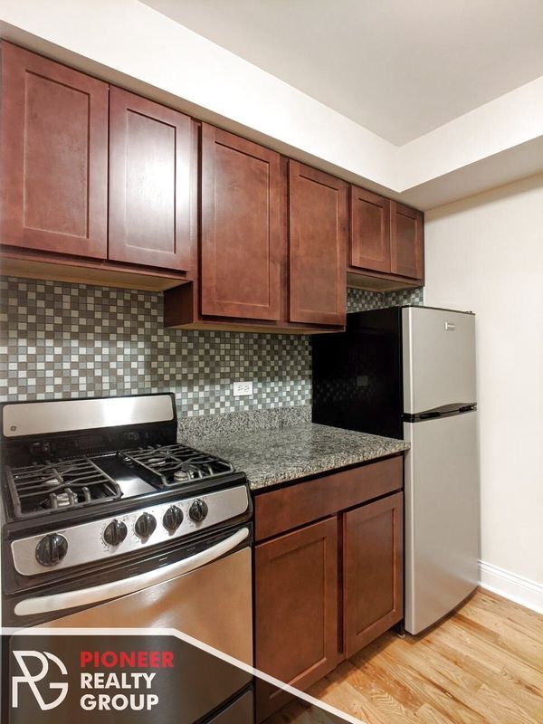 Building Photo - 555 W Arlington Pl Unit 306