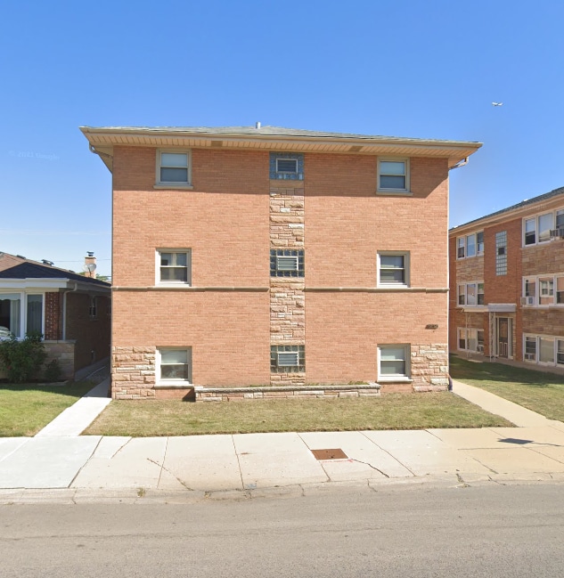 Building Photo - 6852 W Higgins Ave Unit 1st floor