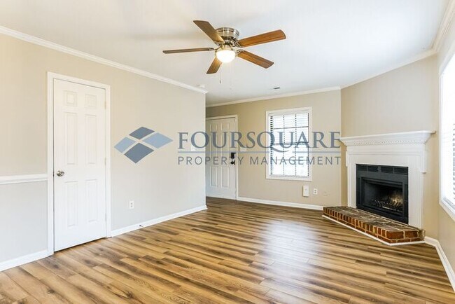 Photo - Inviting 2-Bed Townhome with Front Porch, Private Parking  & Storage