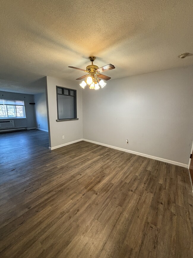 Dining room w view into living room - 5 Turnpike Rd Condo Unit 5 Turnpike Rd Townsend MA