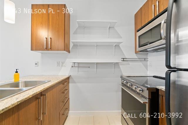 Photo - Spacious 1 Bedroom + Den Condo Unit 303