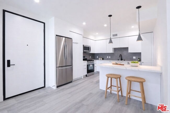 Building Photo - 11800 Courtleigh Dr Unit 306