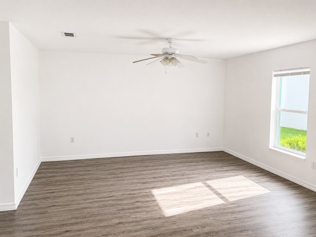 Photo - Spacious 2BR/1BA Duplex with Vaulted Ceilings & Wood-Style Flooring!