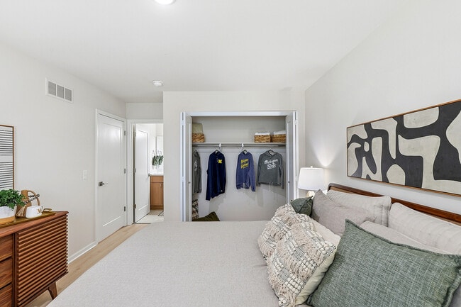 Spacious primary suite featuring a generous step-in closet and private bath