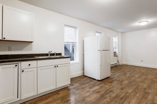 Photo - Welcome home to this newly renovated 2 bedroom top floor apartment