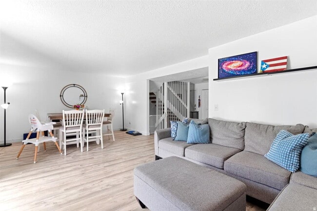 Photo - "Spacious 3-Bed Oasis with Fireplace & Modern Vinyl Touches in Ogden"