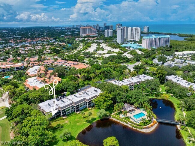 Building Photo - 5950 Pelican Bay Blvd Unit 111 Rental