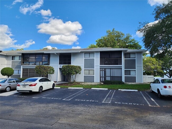 Building Photo - 9717 Hammocks Blvd Unit 208