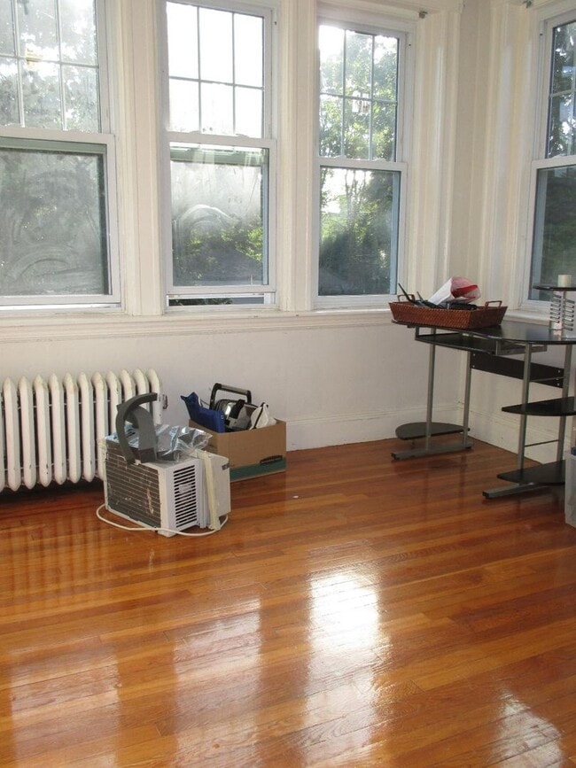 Photo - No brokers Fee, No Security Deposit, Heat, Hot Water Included, Steps from the T Stop