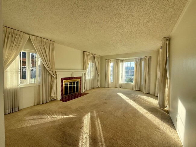 Photo - Charming 3BR/1.5BA Home with Cozy Fireplace