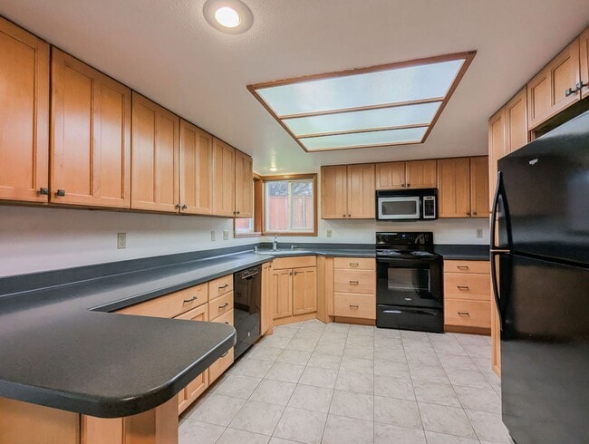 Photo - **Move-In Special** Beautiful 3 bed, 2.5 bath Rambler w/ New Carpet Throughout!