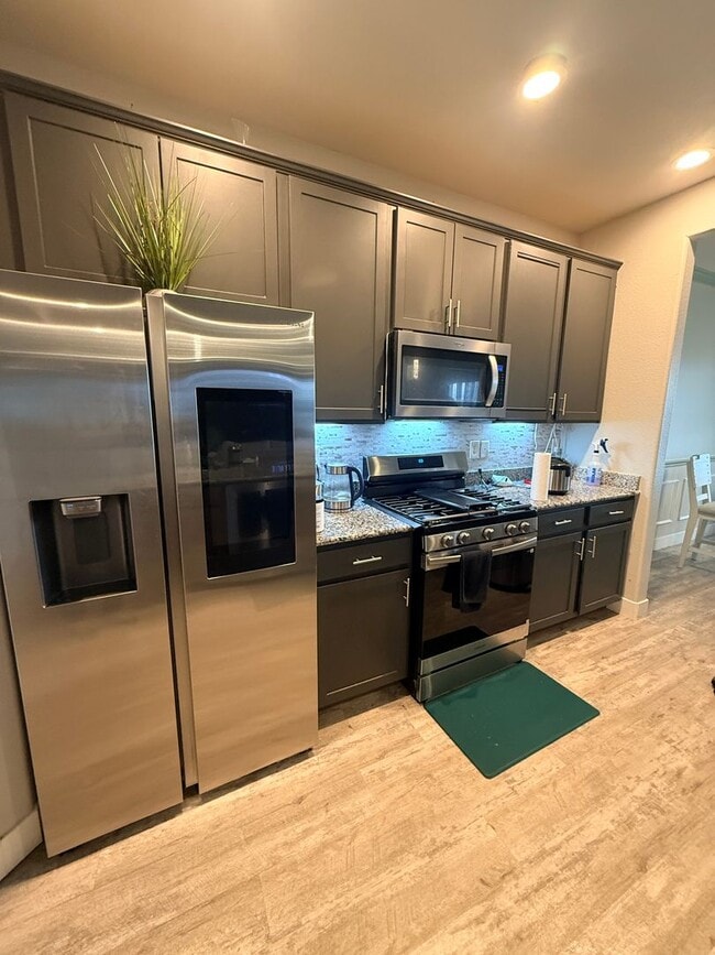 Photo - Like-New 4BR Home with EV Charging & Designer Upgrades