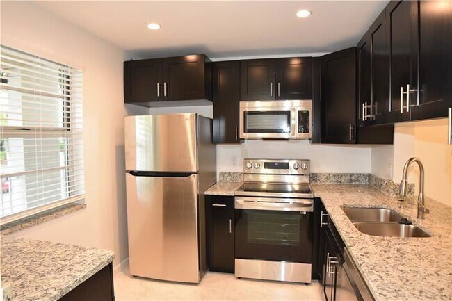 Photo - 8750 Royal Palm Blvd Unit 204A