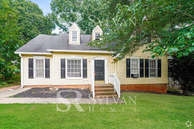Building Photo - Feel welcome in this well-maintained 4BR 2... Rental