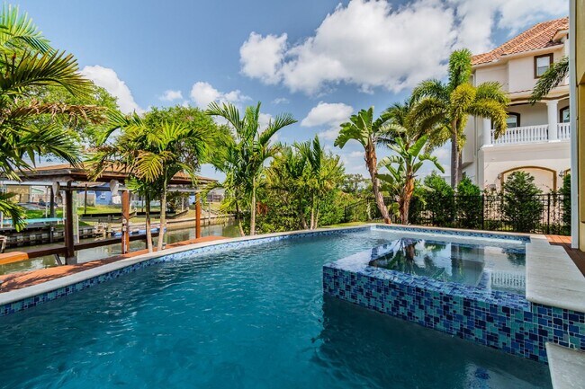 Photo - FURNISHED WATERFRONT 4 BED 3 BATH POOL HOM...