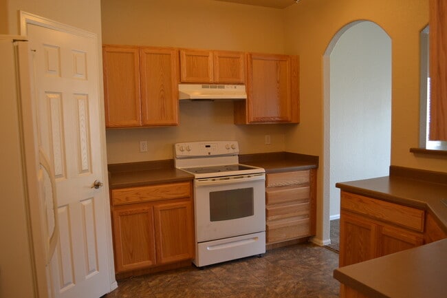 Photo - 4 Bedroom Home w/ a 3 Car Tandem Garage!