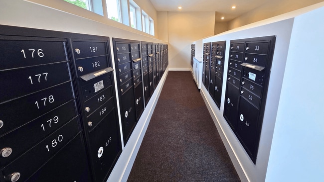Secure mailboxes and package area at Greenwood Commons.