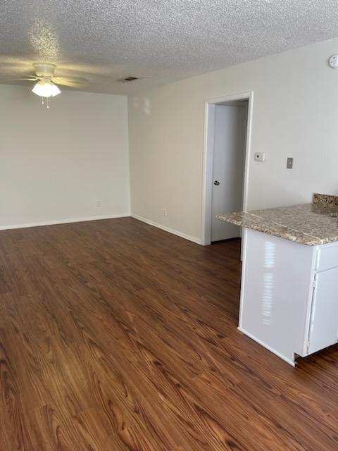MOVE-IN READY. Single level, pet friendly front-end fourplex townhome, UPGRADED WIDE PLANK FLOORI...