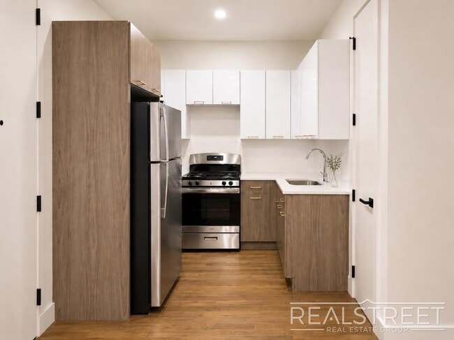 Photo - Modern Two-Bedroom with In-Unit Laundry and G Train Access — Available September 1 Unit 3B
