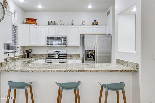 Photo - 9100 E Raintree Dr Unit 130