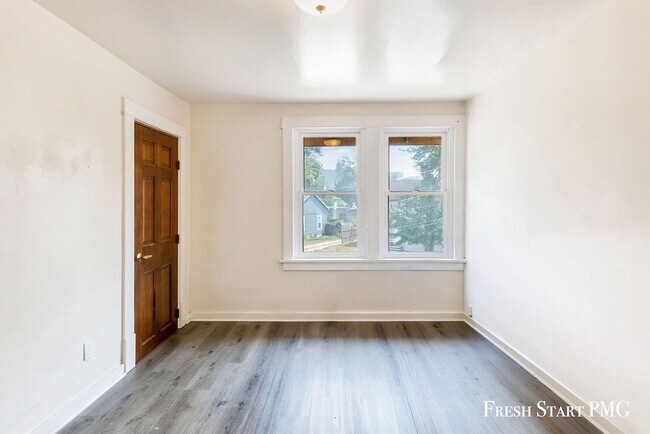 Photo - Light-Filled & Well-Connected Living – 1 B...