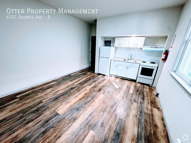 Building Photo - Stylish 1BR Apartment | Prime Location on ... Unit A