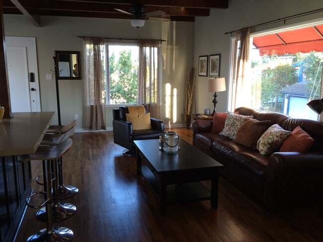 Partial view of ocean from living room - 1219 17th St Unit Upper