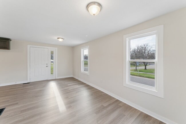 Photo - This cozy residence features a bright living space and well-appointed kitchen.  1st month is FREE...