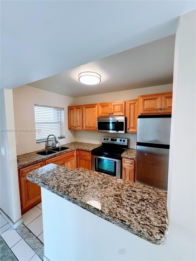 Photo - 8595 Sunrise Lakes Blvd Unit 312